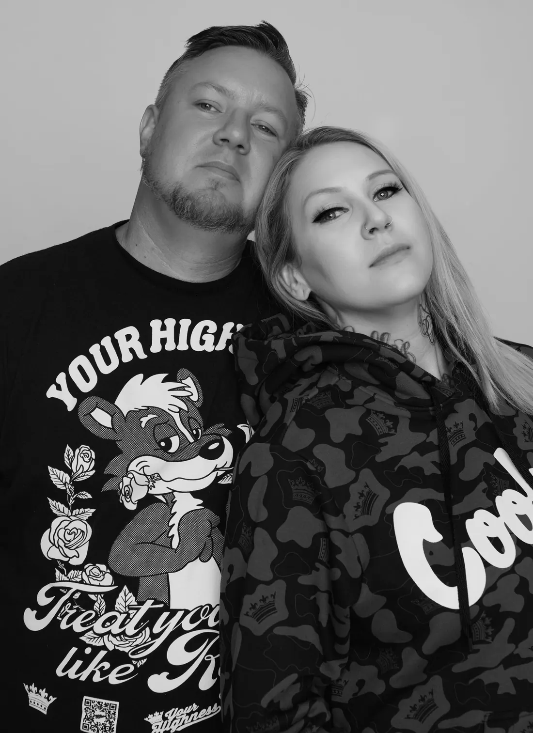 Your Highness founders wearing the brand merch